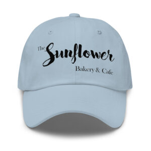 Light blue Sunflower dad hat with embroidered bakery logo.